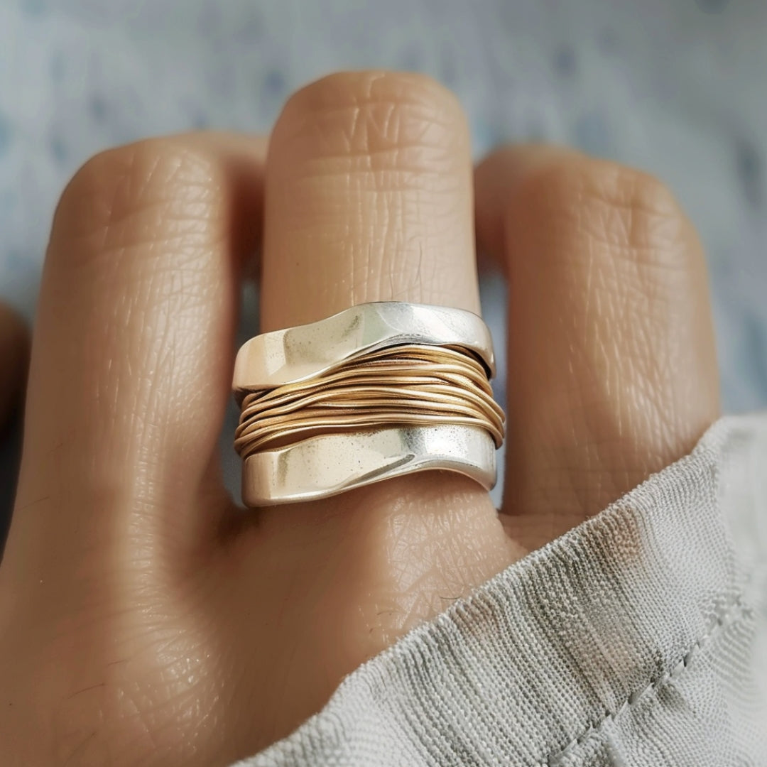 Anello in fili d'argento dorato