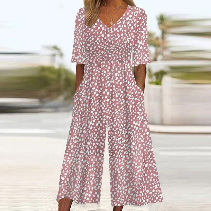 Tuta V-Neck Rosa con Tasche Laterali