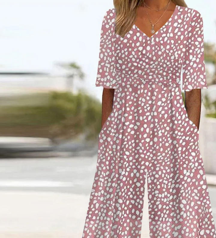Tuta V-Neck Rosa con Tasche Laterali