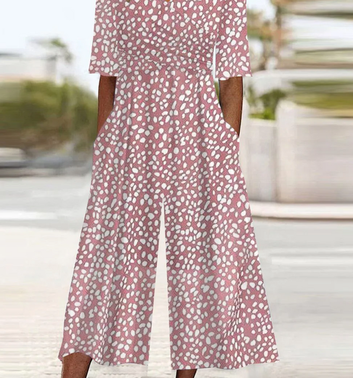 Tuta V-Neck Rosa con Tasche Laterali