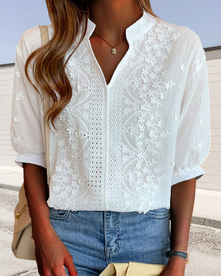 Blusa con scollo a V e maniche a sbuffo con decorazione in pizzo