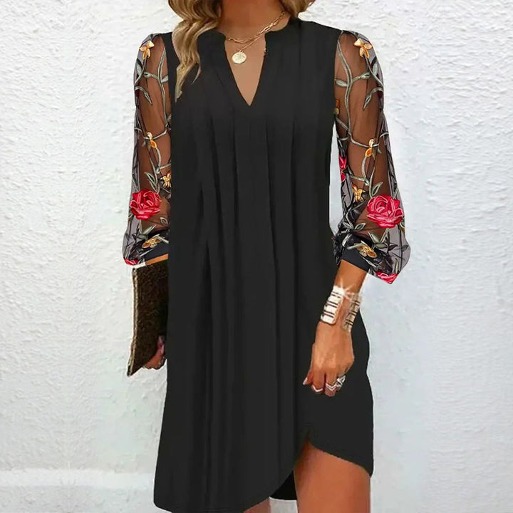 Renée™ | Elegante Minidress con scollatura a V e maniche trasparenti
