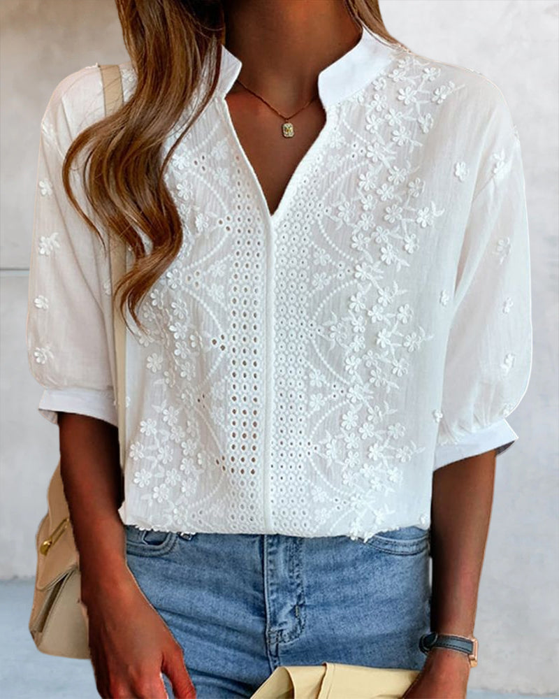 Blusa con scollo a V e maniche a sbuffo con decorazione in pizzo