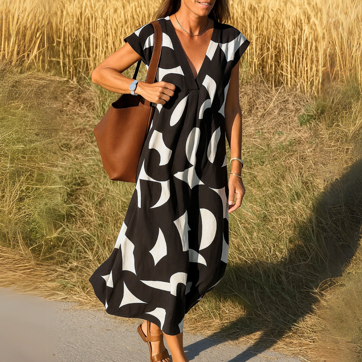SYLVINA | ABITO FLUIDO CON SCOLLO A V