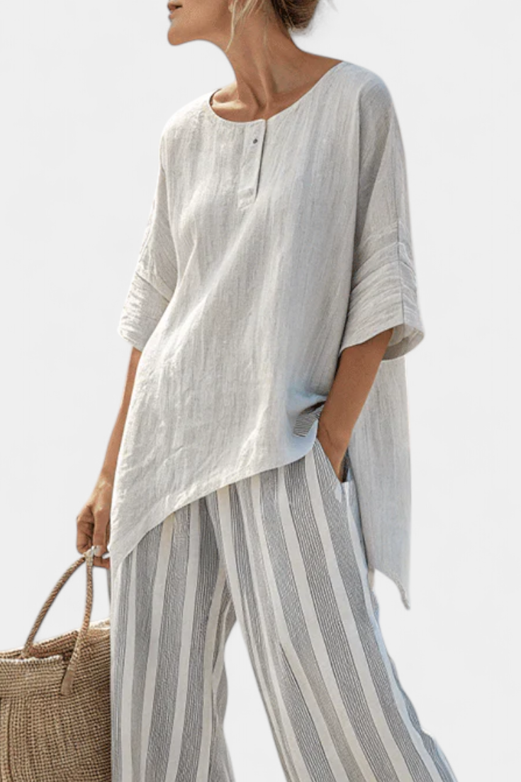 Set Blusa Asimmetrica Daisy e Pantaloni a Righe per un Look Chic e Contemporaneo